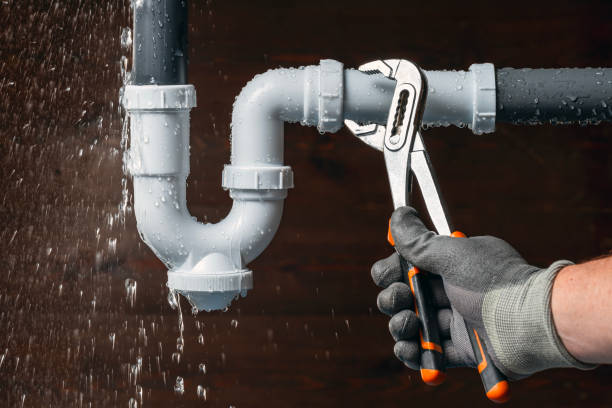 Professional Drain Cleaning technician working in Salem, IN
